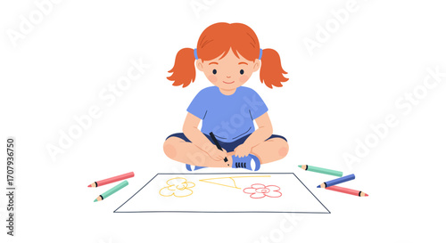 A cute little girl with red pigtails sits cross-legged on the floor, drawing with colored pencils on a large sheet of paper.