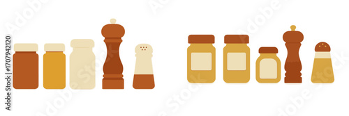 Assortment of kitchen spice jars, salt shakers, and pepper mills in various sizes and colors for culinary applications