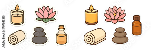 Spa and wellness items with burning candles, pink lotus flowers, essential oil bottles, rolled towels, and massage stones