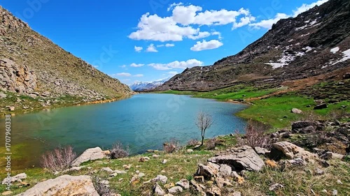 Seasonal wetland nestled among rocky hills and green flora, reflecting the sky's peace and the harmony of untouched nature. 📍Sarpir, Hawraman Takht