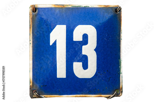 Weathered grunge square metal enameled plate of number of street address with number 13 isolated on white background