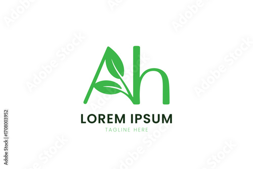 Minimalist green ah logo with leaf accents simple nature inspired brand identity