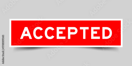 Red color square shape sticker label with word accepted on gray background