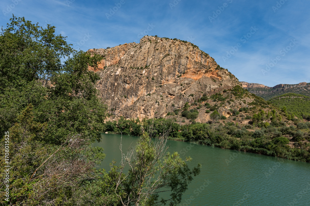 Fototapeta premium lake and mountains from the path that surrounds the Sant Llorenc de Montgai reservoir, La Noguera, Lleida.