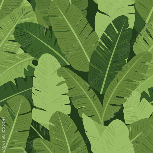 A vibrant pattern of large green banana leaves overlapping creating a lush tropical jungle.