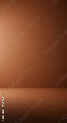 A minimalist studio space with a warm brown backdrop and floor, ideal for product photography.