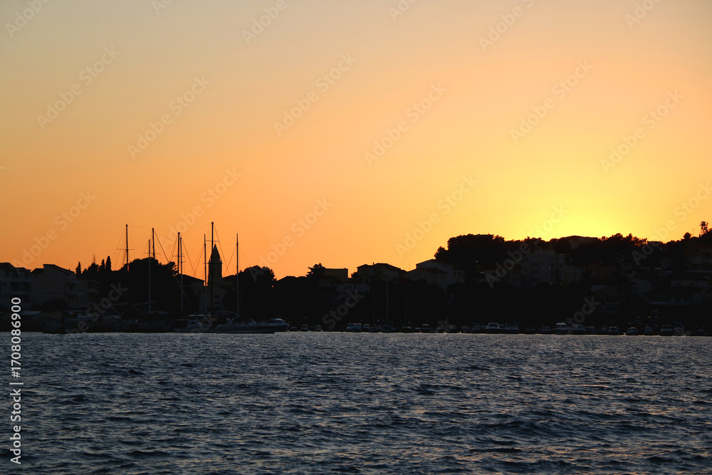 Fototapeta premium Beautiful sunset in Stobrec, small coastal town near Split, Croatia.