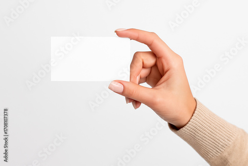 hand holding blank business card