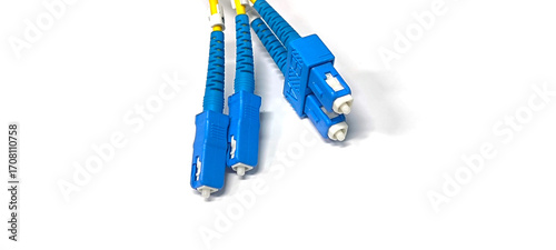 Blue fiber optic cable with blue cable and yellow cable on a white background.