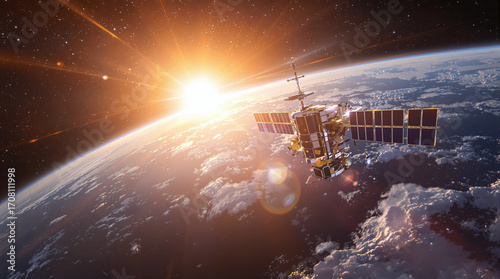 Satellite Orbiting Earth at Sunrise
