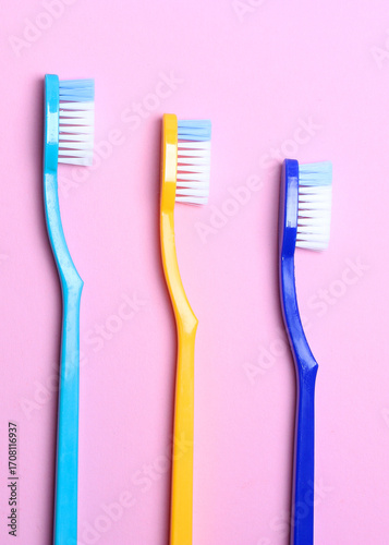 Wallpaper Mural Toothbrushes on a colored background top view. Oral hygiene.. Vertical photo format Torontodigital.ca