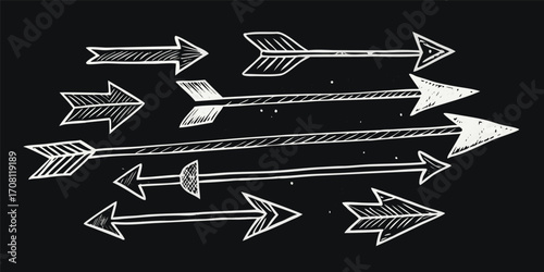 Hand drawn arrows in various styles on black background navigational directional elements indicating movement forward progression sketchy design grunge texture graphic illustration