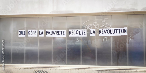 French protest poster stuck on a wall by left wing feminists saying 