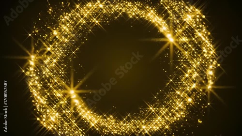 Golden glitter forms a ring on a dark background