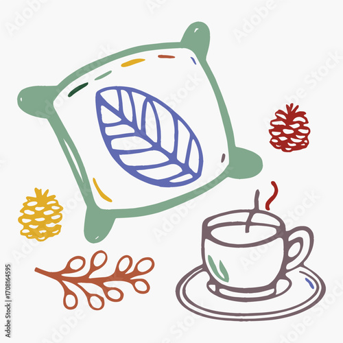 A Cozy Arrangement Featuring a Leaf-Patterned Pillow, a Cup of Tea, and Decorative Natural Elements for a Warm Atmosphere