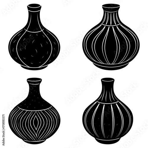 Four black and white vases with different designs and shapes arranged in a square pattern on white background