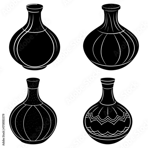 Collection of four black and white vases with different designs and shapes on a white background artful display