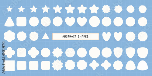 Assorted White Geometric and Organic Shapes on Blue Grid Background