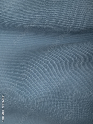 Light blue dense fabric, ironed, the texture of the fabric is visible