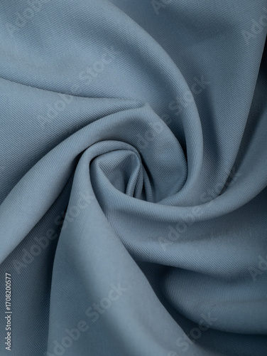 Light blue dense fabric, ironed, the texture of the fabric is visible