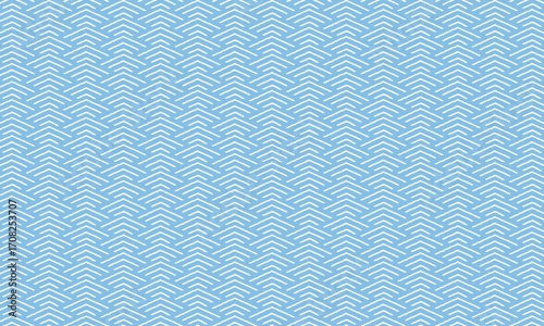 角が丸いラフな線の小波模樣が広がる水色の壁紙