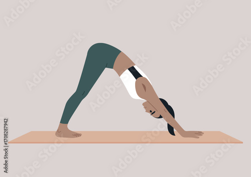 A person holds the inverted V yoga pose, balancing strength and flexibility on a yoga mat, The calm environment enhances focus and promotes a sense of peace during practice.
