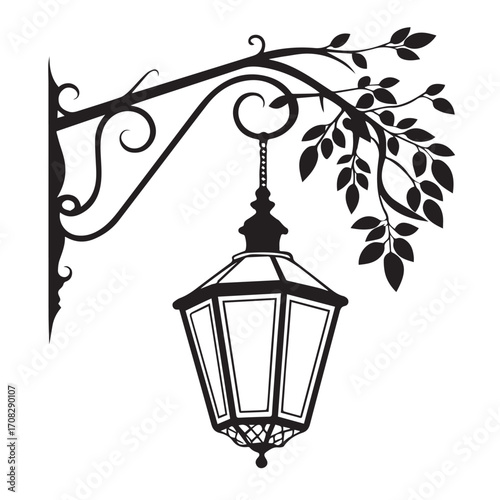 Vintage ornate street lamp hanging from a decorative bracket with leafy branches, isolated on white background