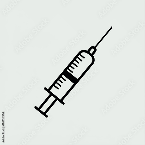 A black and white illustration of a syringe.