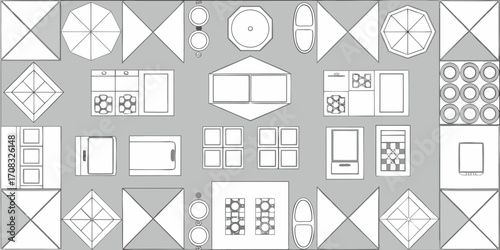 Top down view of a floor plan layout with furniture and kitchen appliances in a schematic drawing style