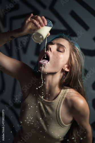 A young woman with blue-streaked