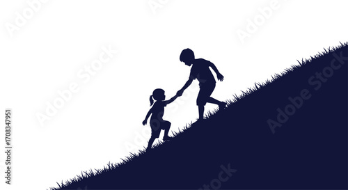 Two children climbing a grassy hill helping each other.