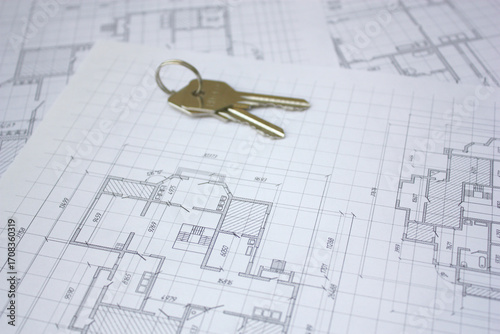 Keys to the apartment. Architectural plan of the house. Construction of a house.