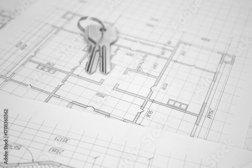 House keys . Architectural plan of the house. Construction of a house.