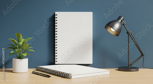 Minimalist Workspace with Blank Notebooks, Green Plant, and Modern Lamp