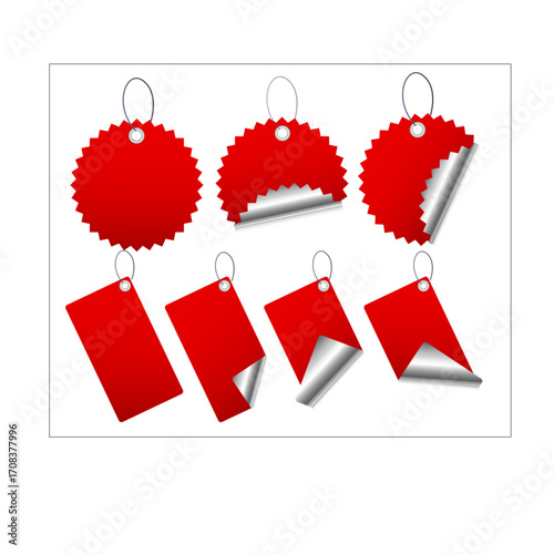 Red price tags, various shapes and styles, hanging and peeling.