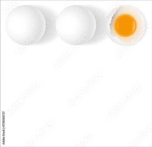 Three white boiled eggs in a row one cut open showing the yolk.