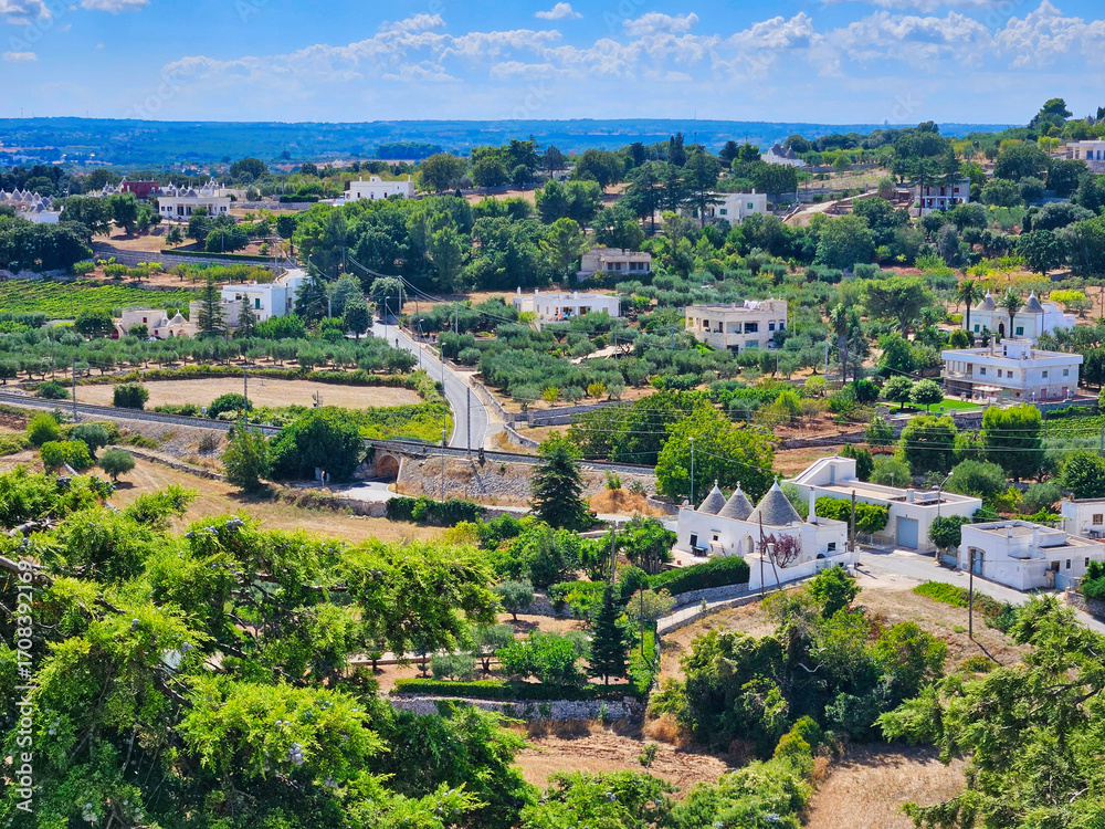 Fototapeta premium Aerial drone photo. Saint rmy de provence. Valley with olive trees and rural houses. Aerial view of the town of hebden bridge in west yorkshire in summer. Chatillon village aerial. Aerial view.
