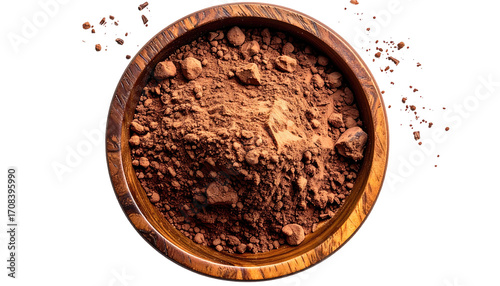 Dark cocoa powder in wooden bowl
