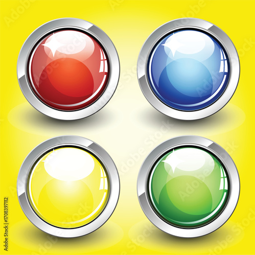 Four colorful round buttons with metallic borders.