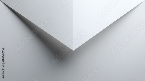 Close Up of White Paper Corner on Flat Surface with Soft Shadows in Minimalist Style