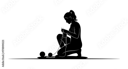 Woman peacefully knitting with yarn and needles, a silhouette of calm focus and creative endeavor.