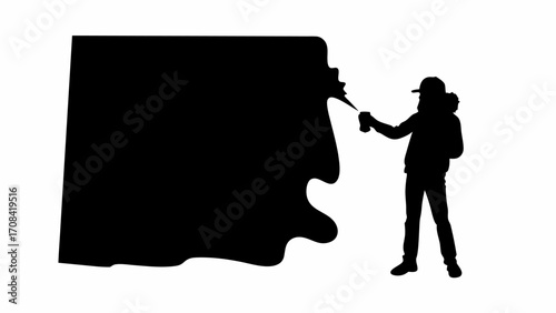 A silhouette of a person spraying a large black shape with a spray can on a white background art image