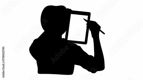 Silhouette of person holding tablet and stylus in hand against a white background in a studio shot