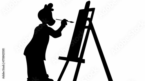 Silhouette of an artist standing and painting on a canvas supported by an easel in a studio setting