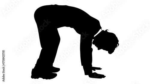 Silhouette of a man in a suit bending over with hands on the ground in a forward fold position pose