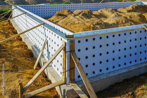 ICF foundation system under construction with thermal insulated concrete form panels