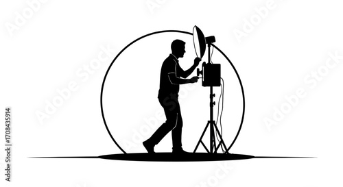 Professional photographer setting up studio lighting for creative photoshoot session