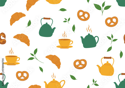 A delightful collection of teapots croissants and pretzels for a cozy afternoon.