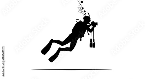 Silhouetted scuba diver captures underwater adventure with camera, bubbles rising