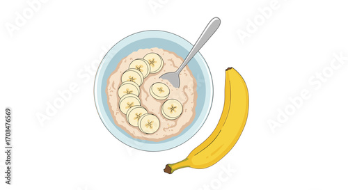 A delicious and healthy bowl of oatmeal topped with fresh banana slices.